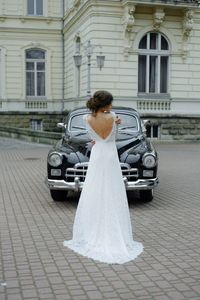 wedding-couple-with-wedding-car-2023-11-27-05-29-55-utc